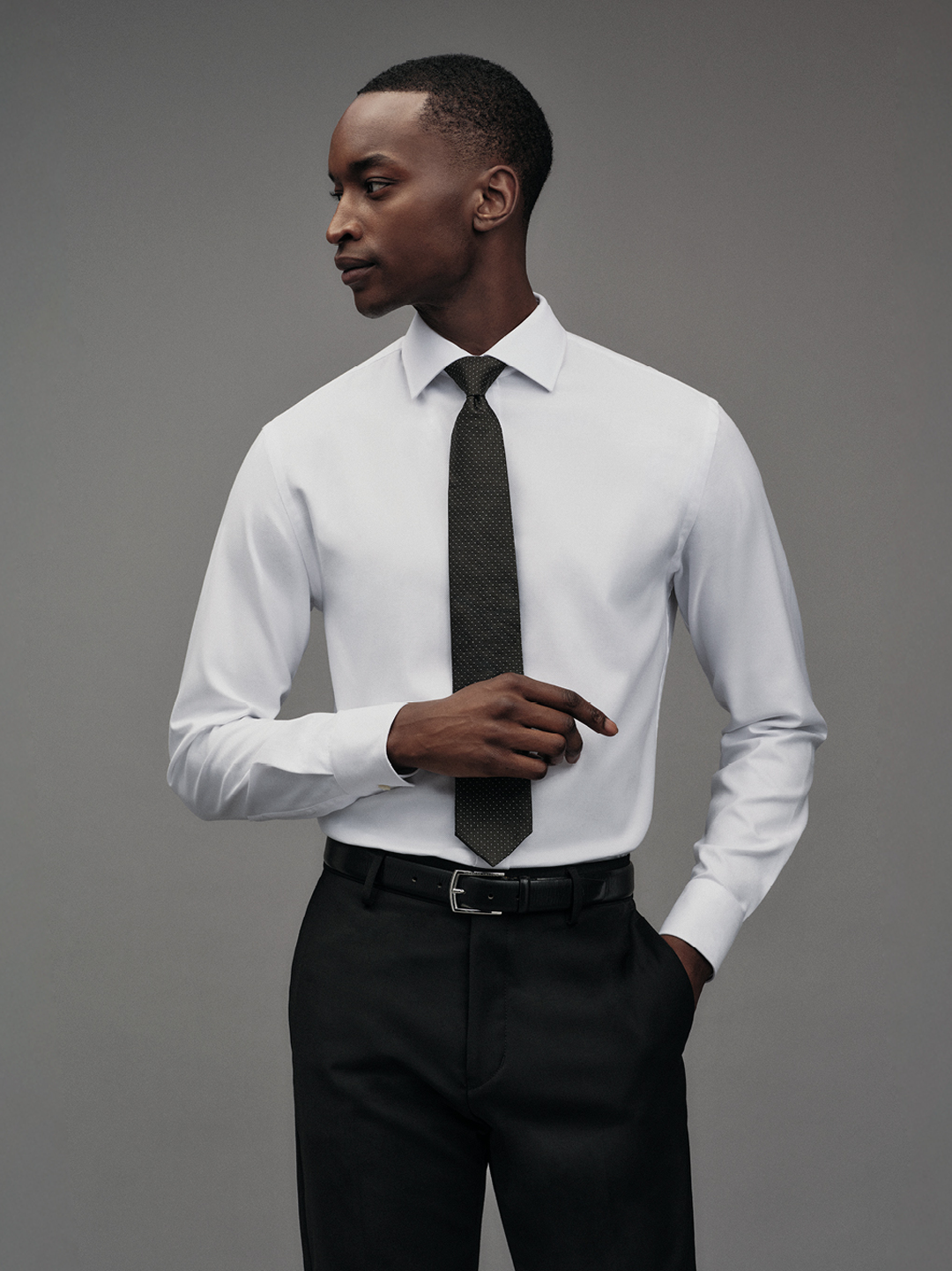 man in white Adley shirt